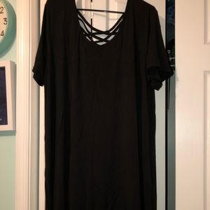 Mid length black dress with patterned back